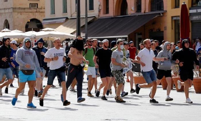 Russian minister says violent fans brought shame on country